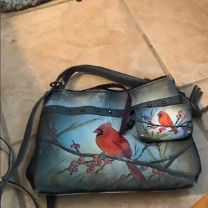 Hand bag by Anuschka with coin purse